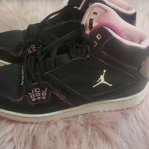 Womans Pink and black Jordans size 7